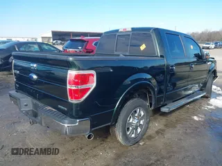 2012 Ford F-150 XL with VIN 1FTFW1CF2CFC15735, listed as a IAAI auction lot 41405687 with 205,457 mi miles. Bid and sale history available at carsss.com. Image 4.