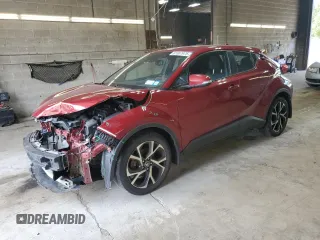 2018 Toyota C-HR XLE with VIN NMTKHMBX7JR032119, listed as a Copart auction lot 61007975 with 100,093 mi miles and Salvage title. Bid and sale history available at DreamBid. Image 1.