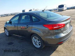 2016 Ford Focus SE with VIN 1FADP3F21GL212718, listed as a IAAI auction lot 41785985 with 101,198 mi miles. Bid and sale history available at carsss.com. Image 3.