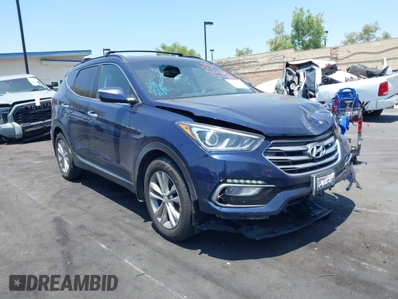 2018 Hyundai Santa Fe 2.0T z VIN 5XYZU4LA8JG537427, wystawiony jako IAAI lot #42349692 z przebiegiem 148 764 mil mil oraz . Historia ofert i sprzedaży dostępna na DreamBid. Obrazek 1.