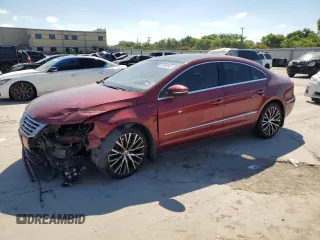 2014 Volkswagen CC Executive with VIN WVWGU7ANXEE526457, listed as a Copart auction lot 55958045 with 118,210 mi miles and Salvage title. Bid and sale history available at DreamBid. Image 1.