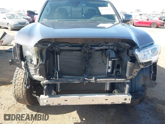 2022 Toyota Tacoma SR with VIN 3TYRX5GN3NT066696, listed as a IAAI auction lot 42514462 with 35,687 mi miles and . Bid and sale history available at DreamBid. Image 6.