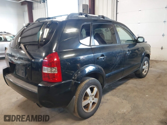 2006 Hyundai Tucson GL with VIN KM8JM12B96U252484, listed as a IAAI auction lot 42100855 with 273,655 mi miles. Bid and sale history available at carsss.com. Image 4.