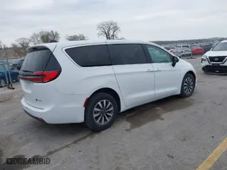 2023 Chrysler Pacifica Hybrid Touring L with VIN 2C4RC1L74PR540870, listed as a IAAI auction lot 42056528 with 46,940 mi miles. Bid and sale history available at carsss.com. Image 4.