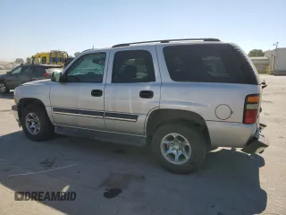 2005 Chevrolet Tahoe LT with VIN 1GNEC13T35R103206, listed as a Copart auction lot 74310784 with 128,780 mi miles and Salvage Title. Bid and sale history available at carsss.com. Image 2.