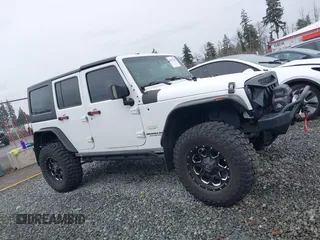 2014 Jeep Wrangler Unlimited Sahara with VIN 1C4BJWEG1EL127232, listed as a IAAI auction lot 41847368 with 109,975 mi miles. Bid and sale history available at carsss.com. Image 13.