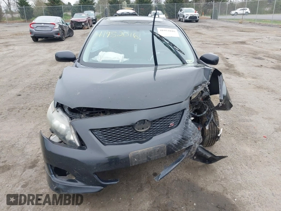 2009 Toyota Corolla with VIN 2T1BU40E89C157455, listed as a IAAI auction lot 41952016 with 211,792 mi miles. Bid and sale history available at carsss.com. Image 12.