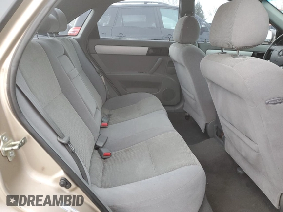 2007 Suzuki Forenza z VIN KL5JD56Z07K657218, wystawiony jako Copart lot #86767854 z przebiegiem 93 044 mil mil oraz Szkoda całkowita • Salvage title. Historia ofert i sprzedaży dostępna na DreamBid. Obrazek 10.