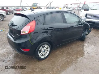 2019 Ford Fiesta SE with VIN 3FADP4EJ3KM165794, listed as a IAAI auction lot 41336199 with 80,653 mi miles. Bid and sale history available at carsss.com. Image 4.