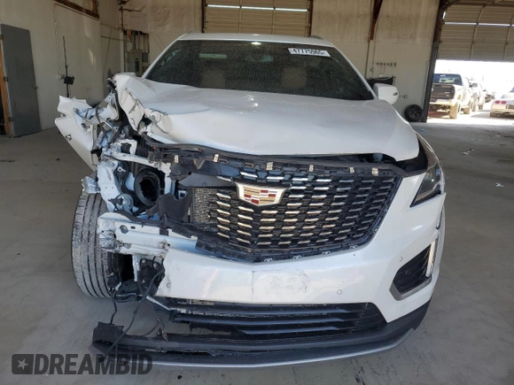 2020 Cadillac XT5 Premium Luxury FWD with VIN 1GYKNCRS9LZ235779, listed as a Copart auction lot 47775965 with 59,501 mi miles and Salvage Title. Bid and sale history available at carsss.com. Image 5.