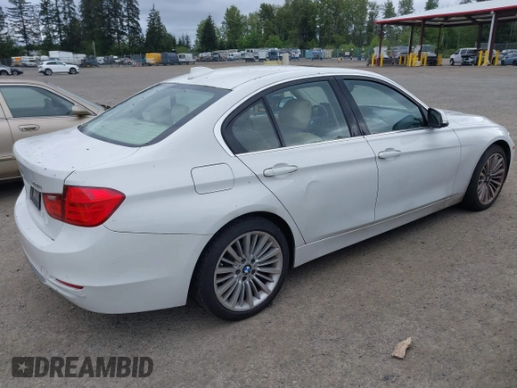 2012 BMW 3 Series 328i with VIN WBA3A5C56CF340427, listed as a IAAI auction lot 42246689 with 149,419 mi miles and . Bid and sale history available at DreamBid. Image 4.