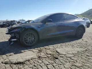 2025 Tesla Model 3 Long Range with VIN 5YJ3E1EA1SF878806, listed as a Copart auction lot 50427005 with 9,790 mi miles and Salvage Title. Bid and sale history available at carsss.com. Image 1.