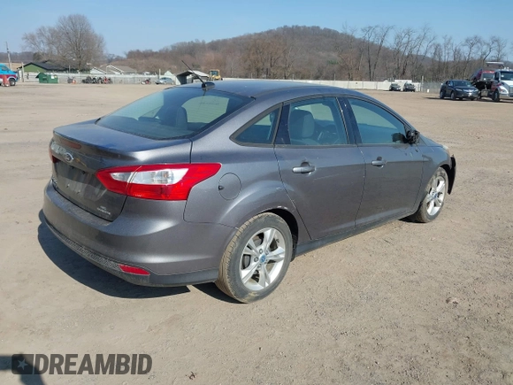 2014 Ford Focus SE with VIN 1FADP3F2XEL170580, listed as a IAAI auction lot 41752699 with 102,666 mi miles. Bid and sale history available at carsss.com. Image 4.