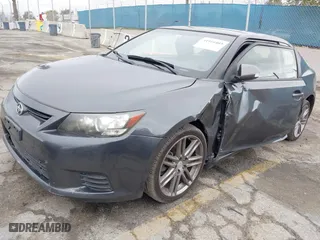 2013 Scion tC with VIN JTKJF5C76D3063500, listed as a IAAI auction lot 41916403 with 146,818 mi miles. Bid and sale history available at carsss.com. Image 2.