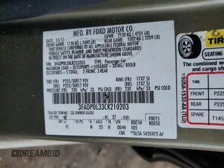 2012 Ford Fusion Hybrid z VIN 3FADP0L33CR210203, wystawiony jako Copart lot #59774345 z przebiegiem 132 152 mil mil oraz Szkoda całkowita • Salvage title. Historia ofert i sprzedaży dostępna na DreamBid. Obrazek 12.