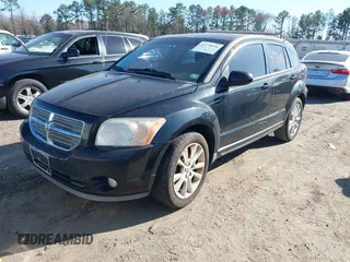 2011 Dodge Caliber Heat with VIN 1B3CB5HA3BD160968, listed as a IAAI auction lot 41770156 with 176,259 mi miles and . Bid and sale history available at DreamBid. Image 2.