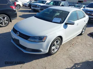 2014 Volkswagen Jetta Sedan TDI with VIN 3VWLL7AJ8EM284323, listed as a IAAI auction lot 41712828 with 192,625 mi miles. Bid and sale history available at carsss.com. Image 2.