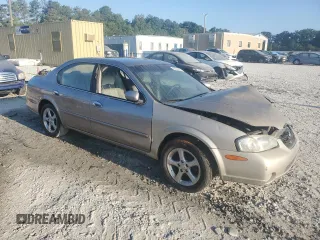 2001 Nissan Maxima GXE z VIN JN1CA31D11T828767, wystawiony jako Copart lot #69504024 z przebiegiem 177 431 mil mil oraz Szkoda całkowita • Salvage title. Historia ofert i sprzedaży dostępna na DreamBid. Obrazek 4.