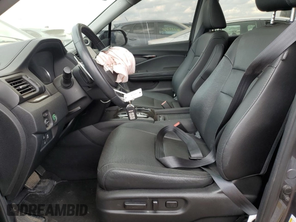 2022 Honda Pilot Touring 7-Passenger with VIN 5FNYF6H6XNB014347, listed as a Copart auction lot 56869745 with 31,513 mi miles and Salvage title. Bid and sale history available at DreamBid. Image 7.