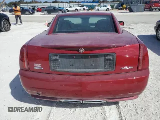 2009 Cadillac XLR Platinum z VIN 1G6YV36A595600621, wystawiony jako Copart lot #75302454 z przebiegiem Nie podano mil oraz Szkody całkowita. Historia ofert i sprzedaży dostępna na DreamBid. Obrazek 6.