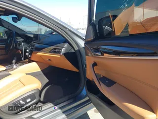 2018 BMW 5 Series 540i with VIN WBAJE5C59JWA96901, listed as a IAAI auction lot 41690919 with 67,395 mi miles and . Bid and sale history available at carsss.com. Image 5.