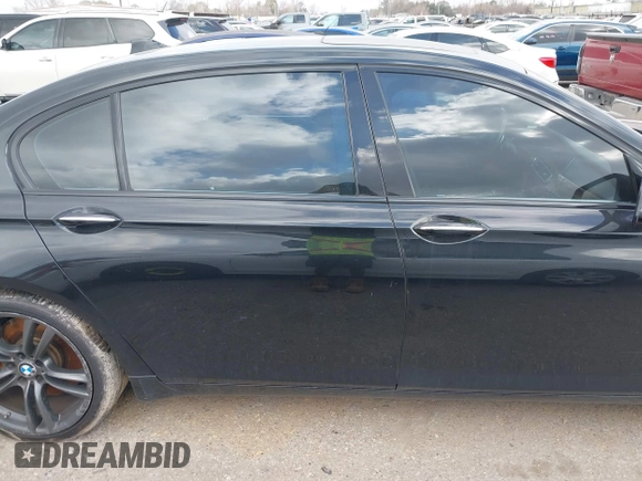 2013 BMW 7 Series 750Li with VIN WBAYE8C55DD133178, listed as a IAAI auction lot 41509860 with 90,841 mi miles and . Bid and sale history available at DreamBid. Image 13.