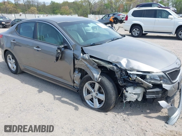 2015 Kia Optima LX z VIN 5XXGM4A76FG421945, wystawiony jako IAAI lot #42112703 z przebiegiem 106 050 mil mil oraz . Historia ofert i sprzedaży dostępna na DreamBid. Obrazek 1.