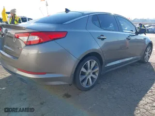 2013 Kia Optima SX w/Limited Pkg with VIN 5XXGR4A69DG190125, listed as a IAAI auction lot 41424498 with 134,056 mi miles. Bid and sale history available at carsss.com. Image 4.