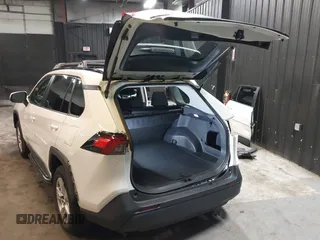 2021 Toyota RAV4 XLE with VIN 2T3P1RFV3MC166504, listed as a IAAI auction lot 42600429 with 63,193 mi miles and . Bid and sale history available at DreamBid. Image 3.