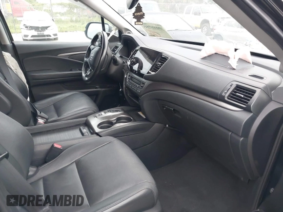 2021 Honda Pilot Special Edition with VIN 5FNYF5H27MB043732, listed as a IAAI auction lot 39777255 with 56,087 mi miles and . Bid and sale history available at DreamBid. Image 5.