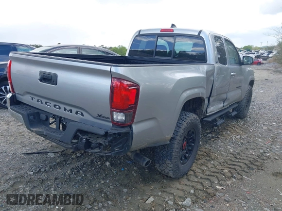 2023 Toyota Tacoma SR with VIN 3TYRX5GNXPT069128, listed as a IAAI auction lot 42007435 with 18,000 mi miles and . Bid and sale history available at DreamBid. Image 4.