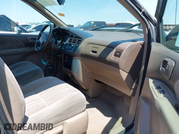 1998 Toyota Sienna LE z VIN 4T3ZF13C1WU043459, wystawiony jako IAAI lot #42475827 z przebiegiem Nie podano mil oraz . Historia ofert i sprzedaży dostępna na DreamBid. Obrazek 5.