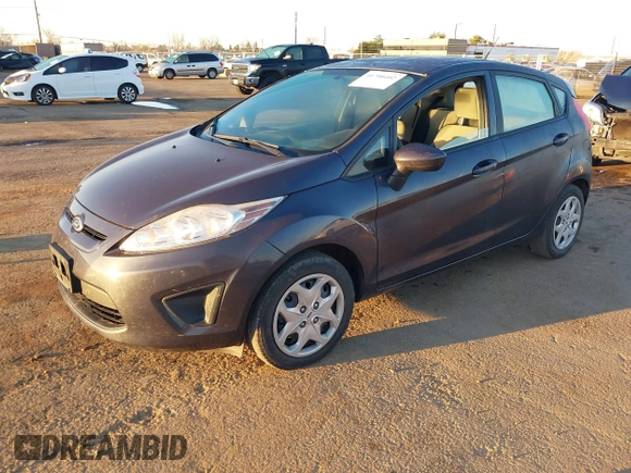 2013 Ford Fiesta S with VIN 3FADP4TJ8DM132523, listed as a IAAI auction lot 41700402 with 53,835 mi miles and . Bid and sale history available at DreamBid. Image 2.