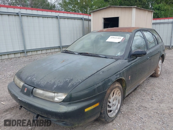 1999 Saturn SW z VIN 1G8ZK8271XZ314797, wystawiony jako IAAI lot #41843385 z przebiegiem 91 599 mil mil oraz . Historia ofert i sprzedaży dostępna na DreamBid. Obrazek 6.