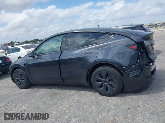 2024 Tesla Model Y Long Range with VIN 7SAYGDEE2RA318579, listed as a IAAI auction lot 41911015 with 9,277 mi miles. Bid and sale history available at carsss.com. Image 14.