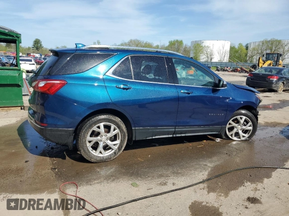 2021 Chevrolet Equinox Premier z VIN 2GNAXXEV9M6115343, wystawiony jako Copart lot #56357955 z przebiegiem 75 439 mil mil oraz Szkoda całkowita • Salvage title. Historia ofert i sprzedaży dostępna na DreamBid. Obrazek 3.
