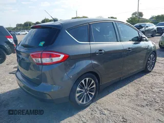 2017 Ford C-Max Energi Titanium with VIN 1FADP5FU9HL117693, listed as a IAAI auction lot 42059763 with 86,827 mi miles. Bid and sale history available at carsss.com. Image 4.
