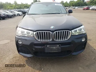 2015 BMW X4 xDrive35i with VIN 5UXXW5C59F0E87517, listed as a Copart auction lot 59604445 with 185,064 mi miles and Salvage title. Bid and sale history available at DreamBid. Image 5.