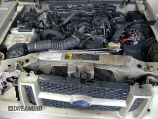 2003 Ford Explorer Sport Trac XLS with VIN 1FMZU67E53UA09799, listed as a Copart auction lot 56620165 with 196,896 mi miles and Salvage title. Bid and sale history available at DreamBid. Image 12.