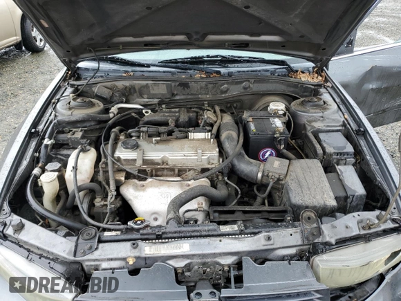 2003 Mitsubishi Galant ES z VIN 4A3AA46G03E180873, wystawiony jako Copart lot #46141195 z przebiegiem 234 709 mil mil oraz Szkoda całkowita • Salvage title. Historia ofert i sprzedaży dostępna na DreamBid. Obrazek 11.