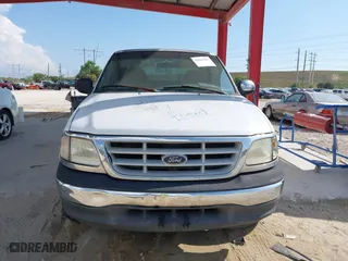 1999 Ford F-150 Work Series with VIN 1FTRX17W5XNB33627, listed as a IAAI auction lot 41933365 with 207,118 mi miles. Bid and sale history available at carsss.com. Image 6.