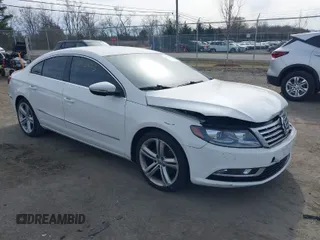 2013 Volkswagen CC Sport with VIN WVWBP7AN2DE546296, listed as a IAAI auction lot 41763823 with 102,028 mi miles. Bid and sale history available at carsss.com. Image 1.