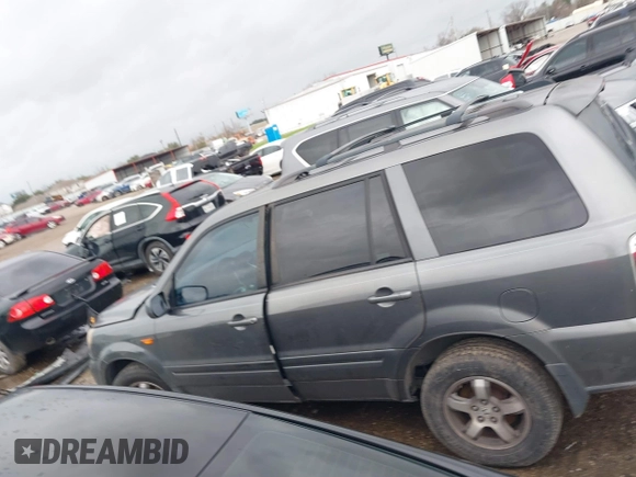 2007 Honda Pilot EX-L with VIN 5FNYF18697B002843, listed as a IAAI auction lot 41549328 with 202,365 mi miles and . Bid and sale history available at DreamBid. Image 14.