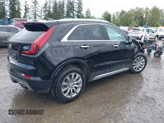 2020 Cadillac XT4 AWD Premium Luxury z VIN 1GYFZDR45LF049638, wystawiony jako IAAI lot #42216996 z przebiegiem 82 760 mil mil oraz . Historia ofert i sprzedaży dostępna na DreamBid. Obrazek 4.