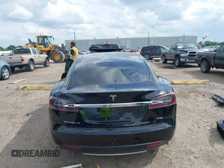 2014 Tesla Model S 60 z VIN 5YJSA1H1XEFP44397, wystawiony jako IAAI lot #42140917 z przebiegiem 136 515 mil mil oraz . Historia ofert i sprzedaży dostępna na DreamBid. Obrazek 17.