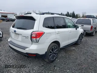2018 Subaru Forester Premium with VIN JF2SJGEC4JH597210, listed as a IAAI auction lot 41904798 with 93,790 mi miles. Bid and sale history available at carsss.com. Image 4.