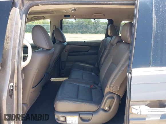 2012 Honda Odyssey Touring with VIN 5FNRL5H93CB109394, listed as a IAAI auction lot 42280018 with 190,412 mi miles and . Bid and sale history available at DreamBid. Image 8.