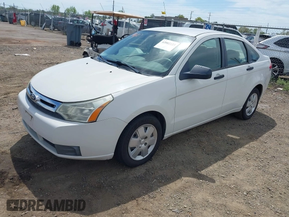 2011 Ford Focus S with VIN 1FAHP3EN7BW113051, listed as a IAAI auction lot 42002223 with 220,895 mi miles. Bid and sale history available at carsss.com. Image 2.