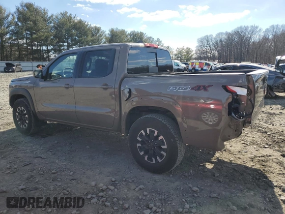 2024 Nissan Frontier Pro-4X with VIN 1N6ED1EK2RN656885, listed as a Copart auction lot 46604165 with 4,390 mi miles and Salvage title. Bid and sale history available at DreamBid. Image 2.