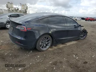 2023 Tesla Model 3 z VIN 5YJ3E1EA0PF451513, wystawiony jako Copart lot #51606425 z przebiegiem 58 482 mil mil oraz Szkoda całkowita • Salvage title. Historia ofert i sprzedaży dostępna na DreamBid. Obrazek 3.